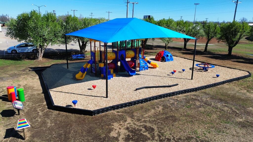 Complete playground with a variety of playground equipment.